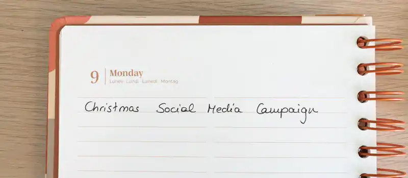 Planner page with note for a Christmas social media campaign.